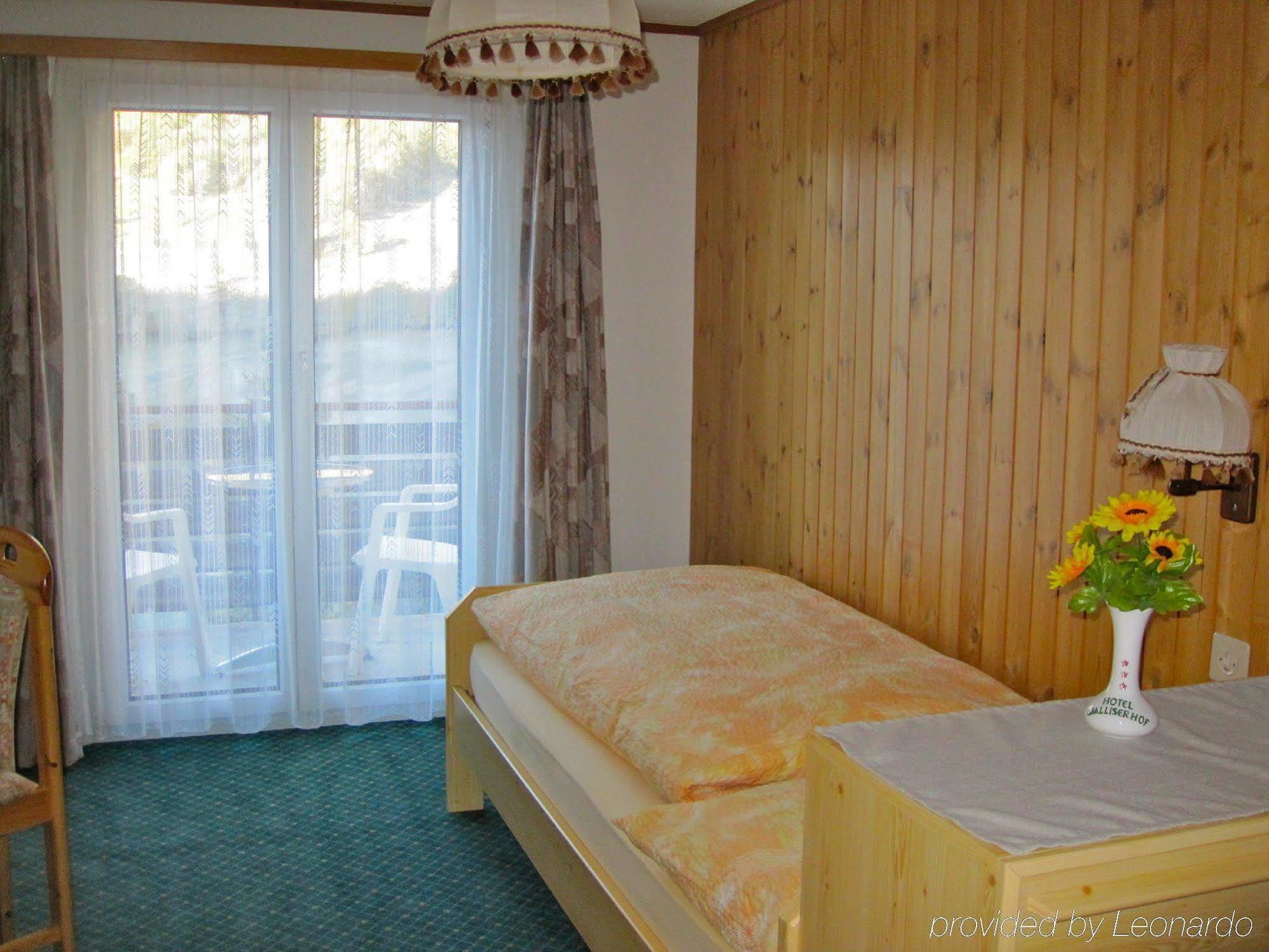 Hotel Walliserhof-Leukerbad-Therme Pokoj fotografie